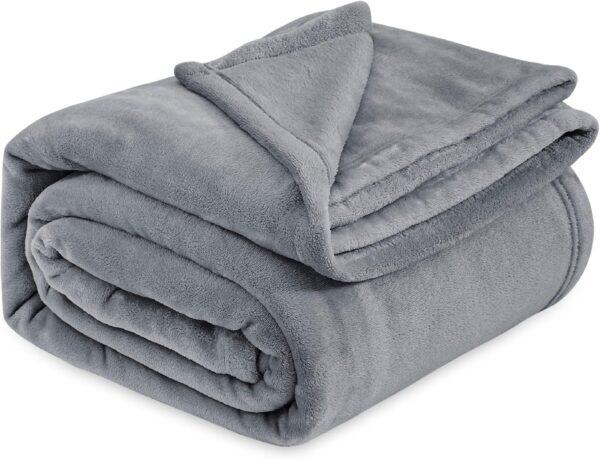 Soft and cozy Bedsure Grey Fleece Bed Blanket, perfect for adding warmth and comfort to your queen-size bed with its plush and lightweight design